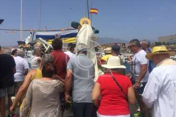 Procesión terrestre-marítimo de la Virgen del Carmen por la bahía de Melenara (Foto TA)